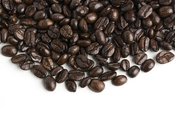 Roasted coffee beans isolated on pure white background for content using.