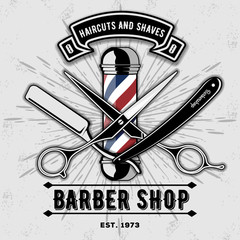 Barber shop vector vintage label, badge, or emblem on gray background. Vector template 