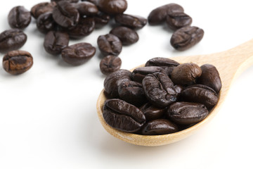 Roasted coffee beans isolated on pure white background for content using.