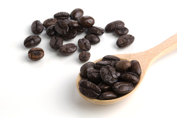 Roasted coffee beans isolated on pure white background for content using.