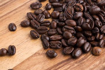 Roasted coffee beans isolated on pure white background for content using.