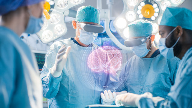 Surgeons Perform Brain Surgery Using Augmented Reality, Animated 3D Brain. High Tech Technologically Advanced Hospital. Futuristic Theme.