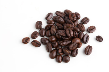 Roasted coffee beans isolated on pure white background for content using.