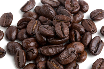 Roasted coffee beans isolated on pure white background for content using.