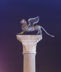 Lion with wings statue, symbol of Venice. Night scene