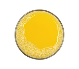 Orange juice in glass isolated on white background, top view