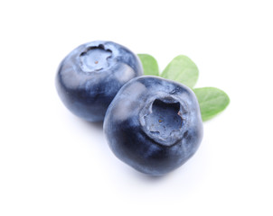 Ripe blueberries on white background
