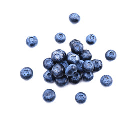 Ripe blueberries on white background