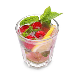 Glass of fresh raspberry mojito on white background