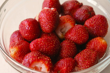 Juicy appetizing tasty strawberry on a bowl.