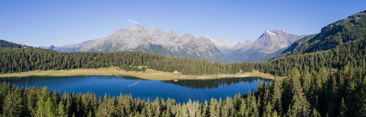 Panoramic view of Palù lake in Valmalenco. Famous destination in Valtellina, Italian Alps