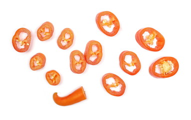Spicy red paprika, pepper slices isolated on white background, top view