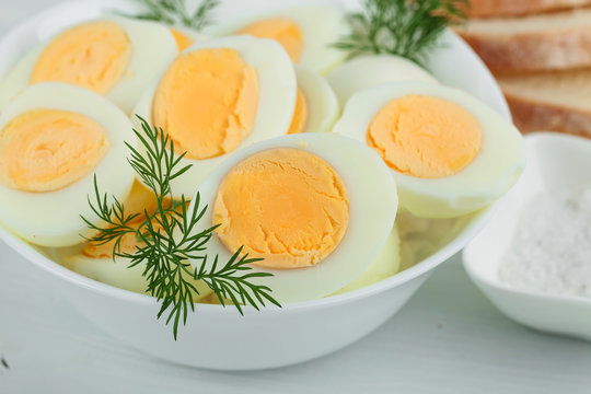 Boiled eggs with dill .