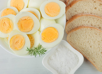 Boiled eggs with dill .