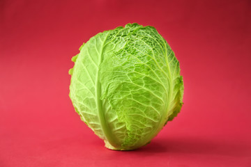 Fresh cabbage on color background