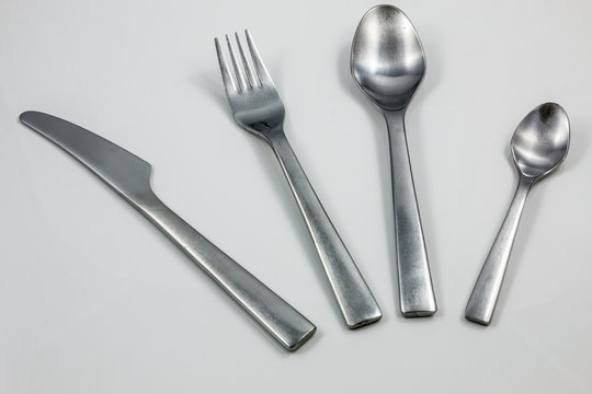 Cutlery with knife, fork, table spoon and little spoon