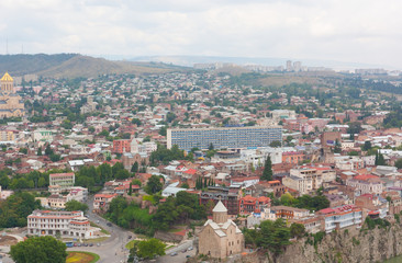 Fototapeta na wymiar Top view of Tbilisi from the Narikala fortress. Tbilisi is the capital of the Republic of Georgia