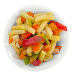 Fresh mixed vegetables in bowl on white. Top view.