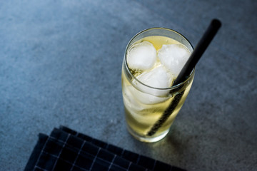 Vodka Energy Cocktail with Ice and Black Straw.