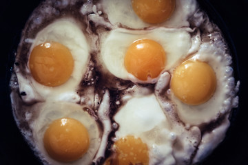 Fried eggs in a frying pan