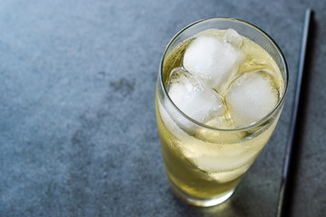 Vodka Energy Cocktail with Ice and Black Straw.