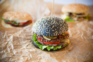 Black burger with thick beef meat