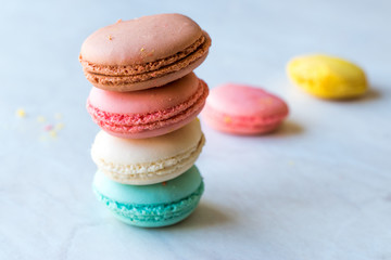 Obraz na płótnie Canvas Colorful French or Italian Macarons stack / Macaroon Cakes