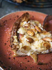 Closeup almond pie isolated on background