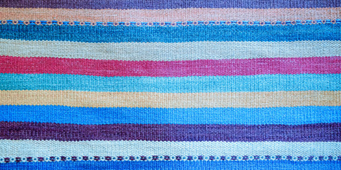 Colorful traditional Peruvian style, close-up rug surface.