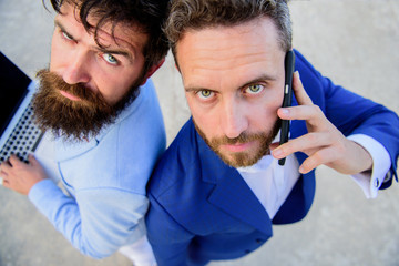 Entrepreneurship as teamwork. Sales and online transaction. Sales department team men stand back to...