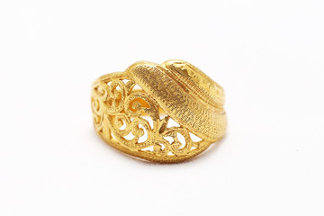 Beautiful gold ring on white background