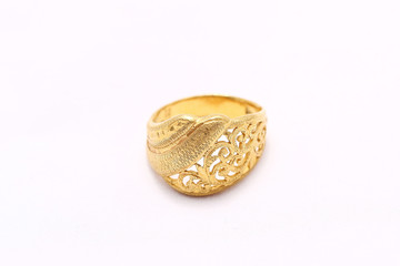Beautiful gold ring on white background