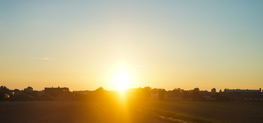 Netherlands, South Holland, a sunset over a body of water