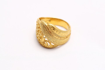 Beautiful gold ring on white background