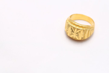 Beautiful gold ring on white background