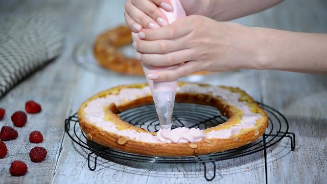 Preparation homemade choux pastry cake Paris Brest. French dessert.