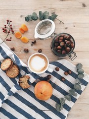 winter foods coffee and cookie with hazelnuts