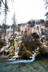 Waterfall from a cliff in the forest - 217304715