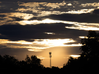 Naklejka premium Mobile Phone Base Station behind The Sun