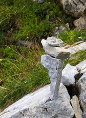 Balancing stacked rocks in the mountains