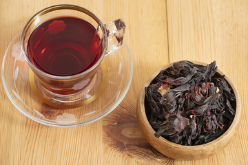 hibiscus on the red tea wooden floor