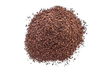 Heap of ground coffee on white. Top view.