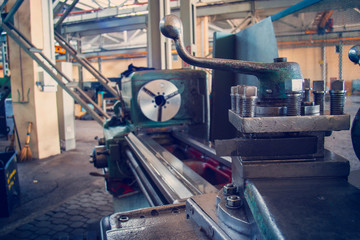 A photo of a bed and guiding lathes at the enterprise in shop wide-angle plan.