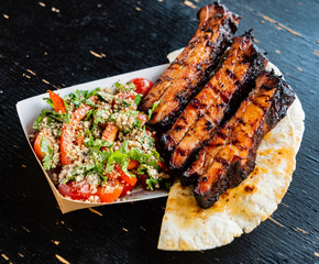 grilled ribs and salad