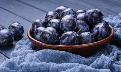 Garden plums in bowl