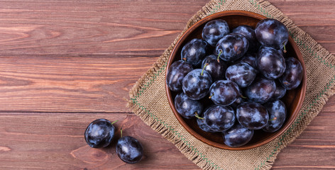 Garden plums in bowl