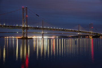 Evening view at Forth Road Bridge and Queensferry Crossing over Firth of Forth near Queensferry in Scotland