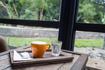 coffee cup and drinking water on table