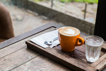 coffee cup and drinking water on table