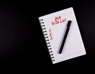 To Do List year 2019, Black Pen and a Notebook, Red text, list 1,2,3. isolated on black background, new year resolution and plans concept